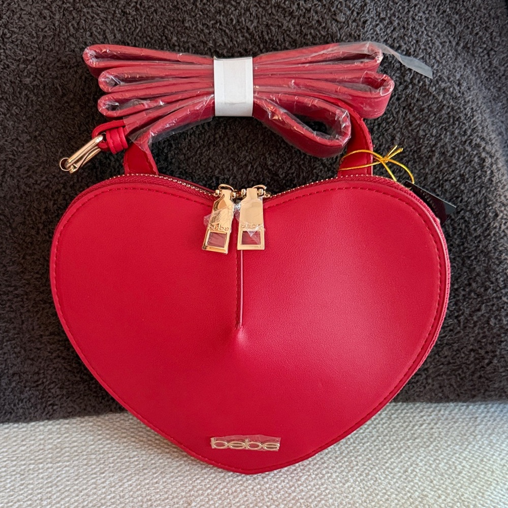 bebe Red Heart-Shaped Crossbody Bag with Gold Accents